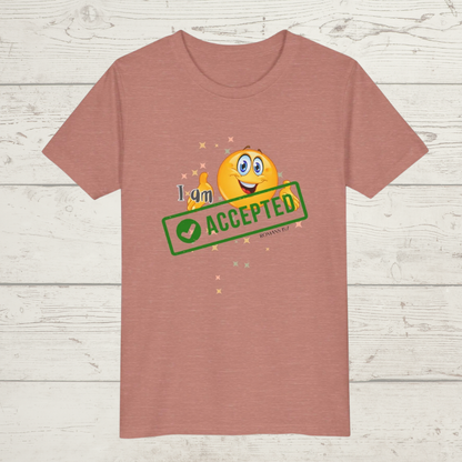 Heather Mauve t-shirt with a smiley face and 'I am accepted' text on a wooden surface