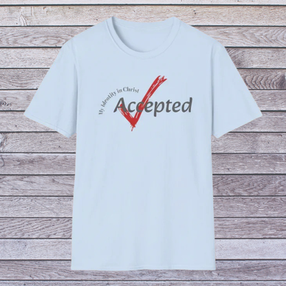 Light blue t-shirt with text and checkmark design on a wooden background