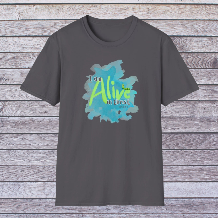 Charcoal Gray t-shirt with 'I am Alive in Christ' design on a wooden background