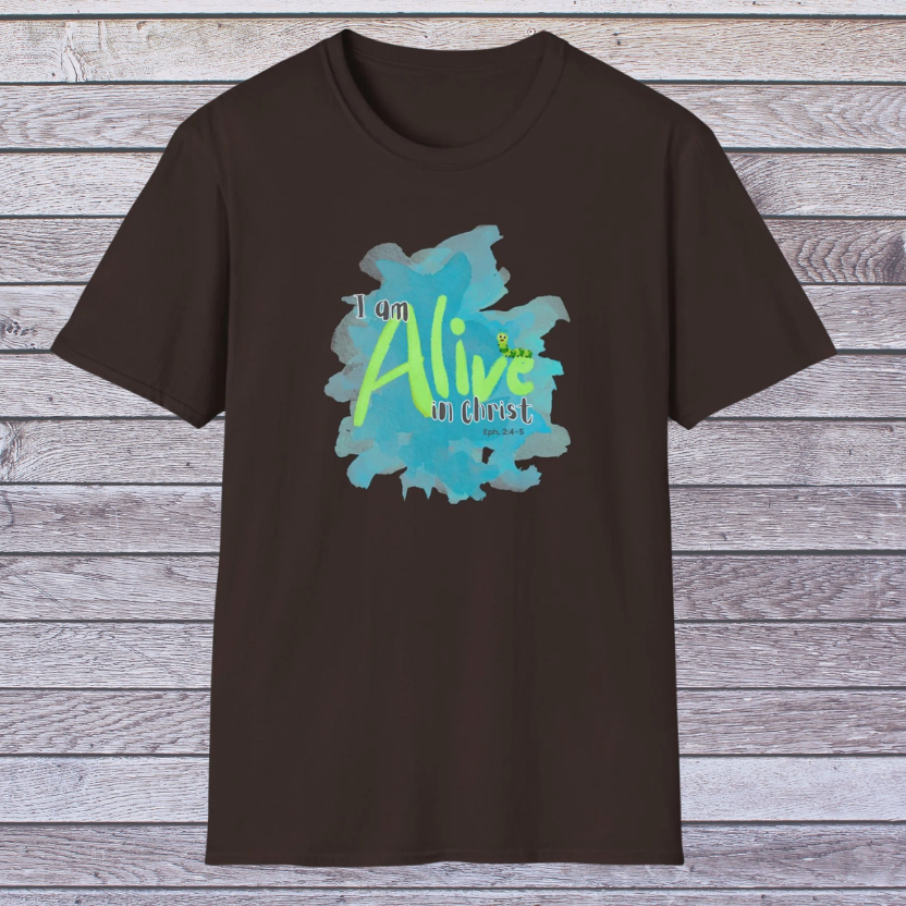 Dark Chocolate Brown t-shirt with 'I am Alive in Christ' graphic on a wooden background