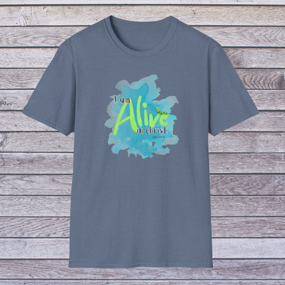 Indigo t-shirt with 'I am Alive in Christ' design on a wooden surface