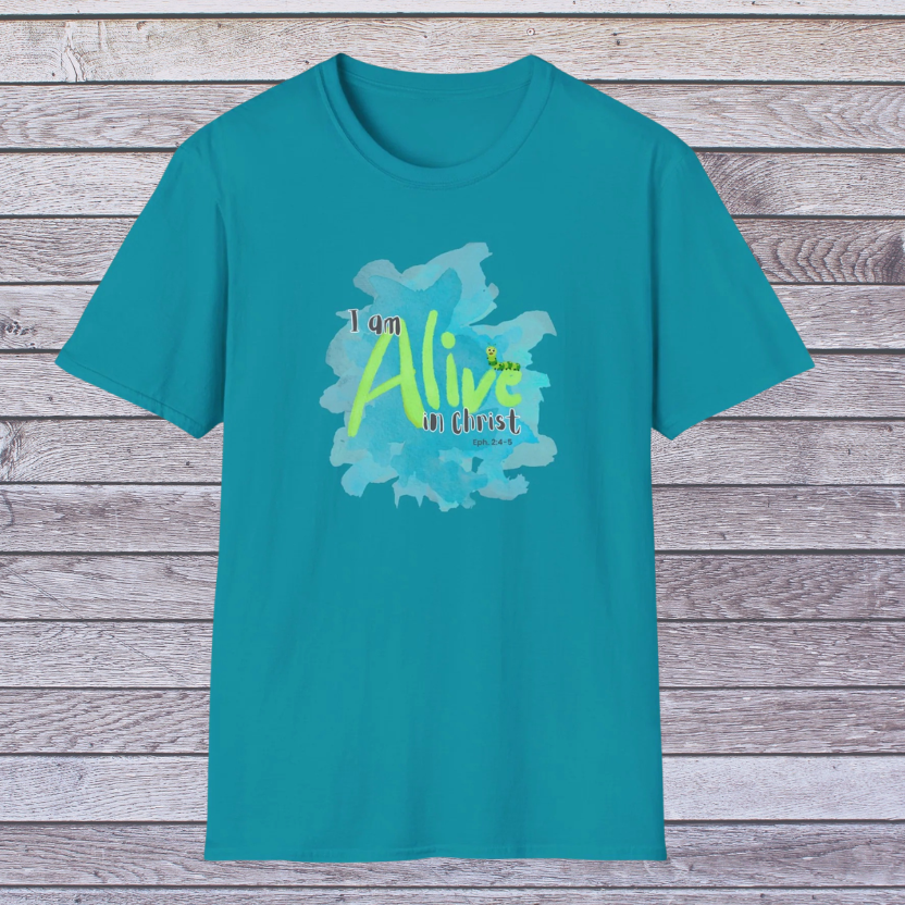 Tropical Blue Teal t-shirt with 'I am Alive' graphic on a wooden background