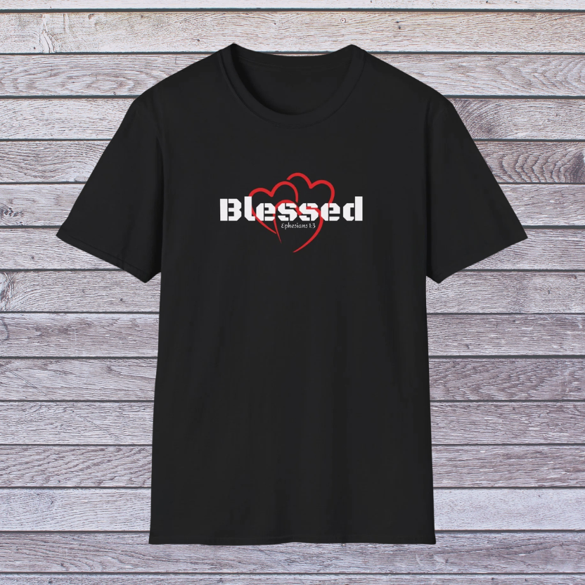 Black t-shirt with 'Blessed' design on a wooden background