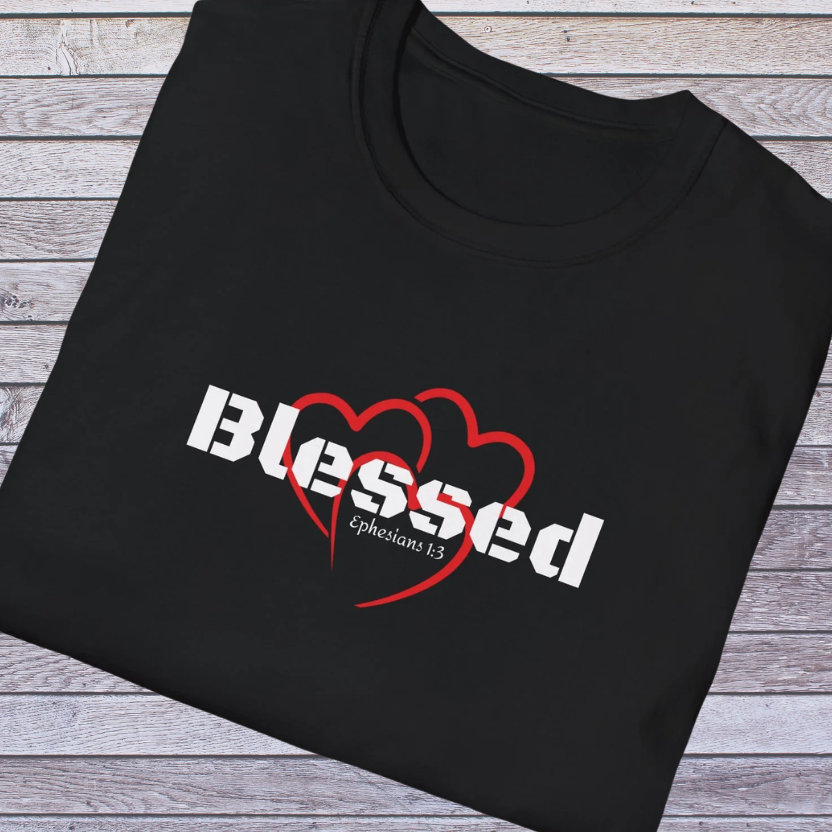 Black t-shirt with 'Blessed Ephesians 1:3' design on a wooden surface