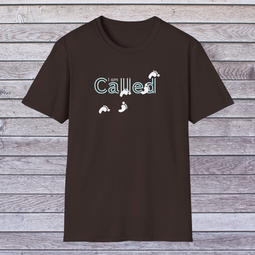 Dark Chocolate Brown t-shirt with 'I am Called' text and footprints on a wooden background