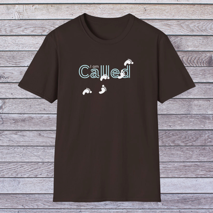 Dark Chocolate Brown t-shirt with 'I am Called' text and footprints on a wooden background