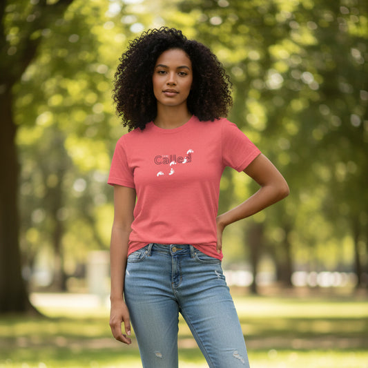 Red t-shirt with a graphic design 'I am Called' outside at the park