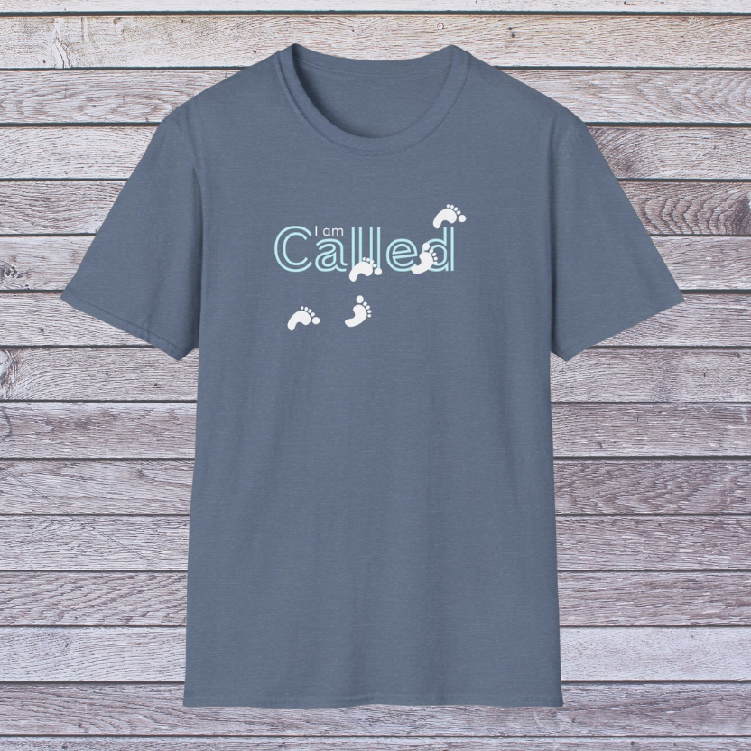 Heather Indigo Gray t-shirt with 'I am Called' text and footprints on a wooden surface