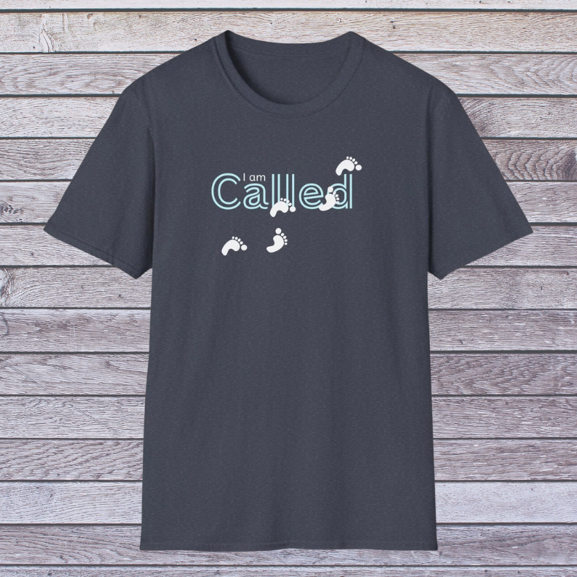 Heather Navy t-shirt with 'I am Called' text and footprints on a wooden background