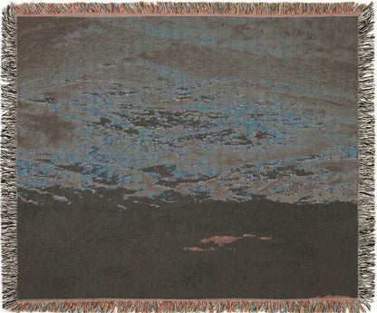 Painted Hills Oregon woven blanket with a landscape design, back view.