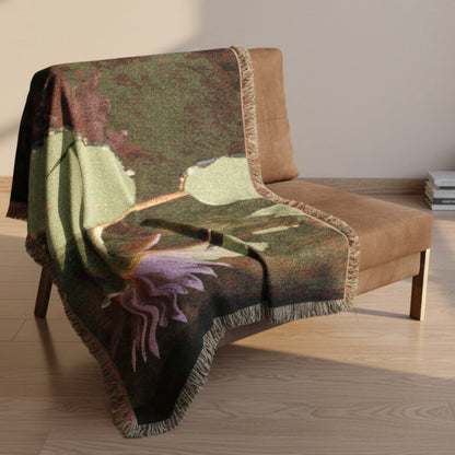 Floral-patterned blanket draped over a brown chair on a white background