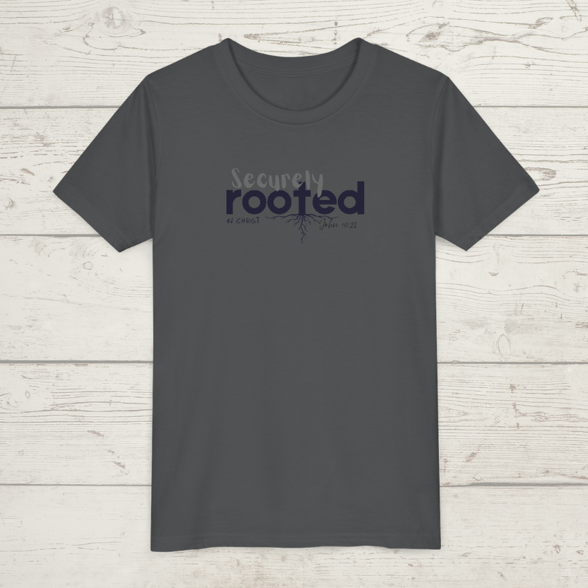 Dark gray t-shirt with 'Securely rooted' text on a wooden surface