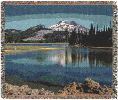 Woven blanket with a scenic landscape of Spark Lake