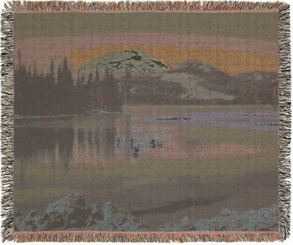 Backside of Sparks Lake Woven blanket with a scenic landscape design