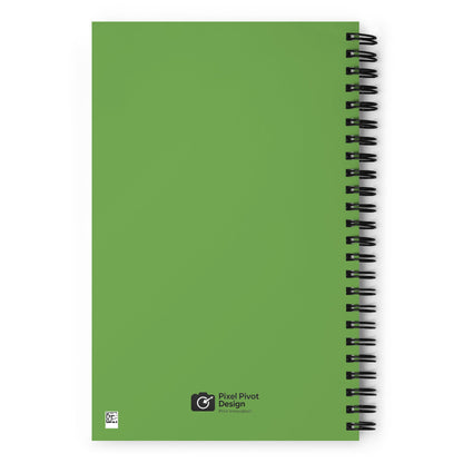 Green notebook with spiral binding on a white background