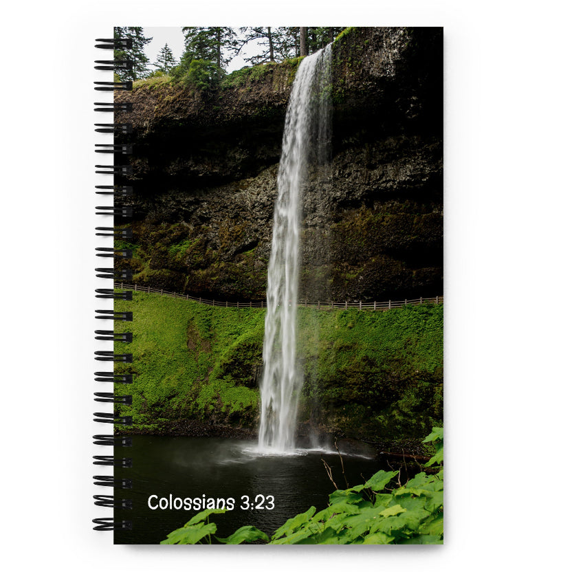 Notebook with a waterfall design in Oregon and 'Colossians 3:23' text on the cover