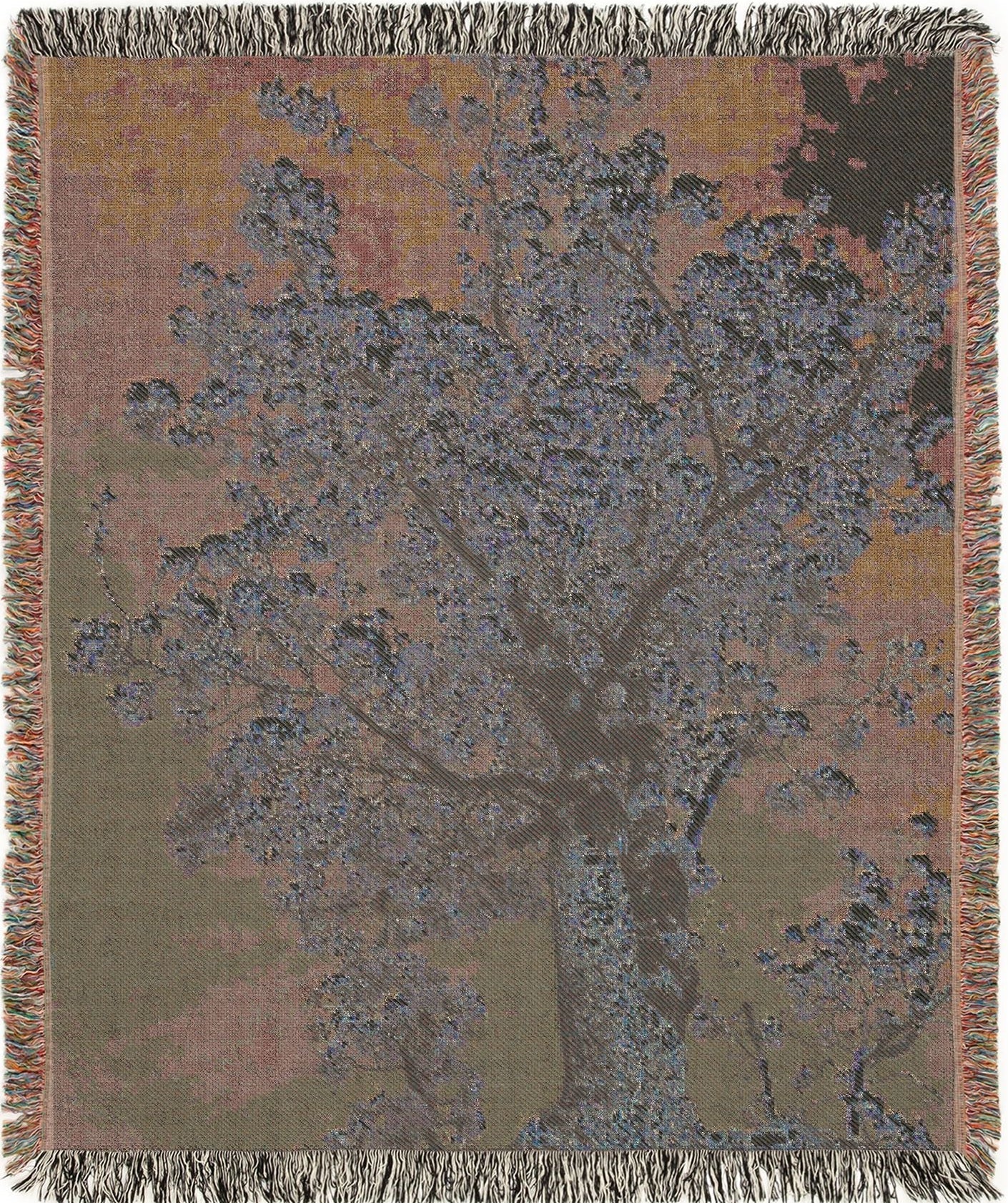 Tree in Bloom woven blanket with nature-themed design, back view