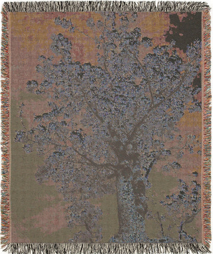 Tree in Bloom woven blanket with nature-themed design, back view