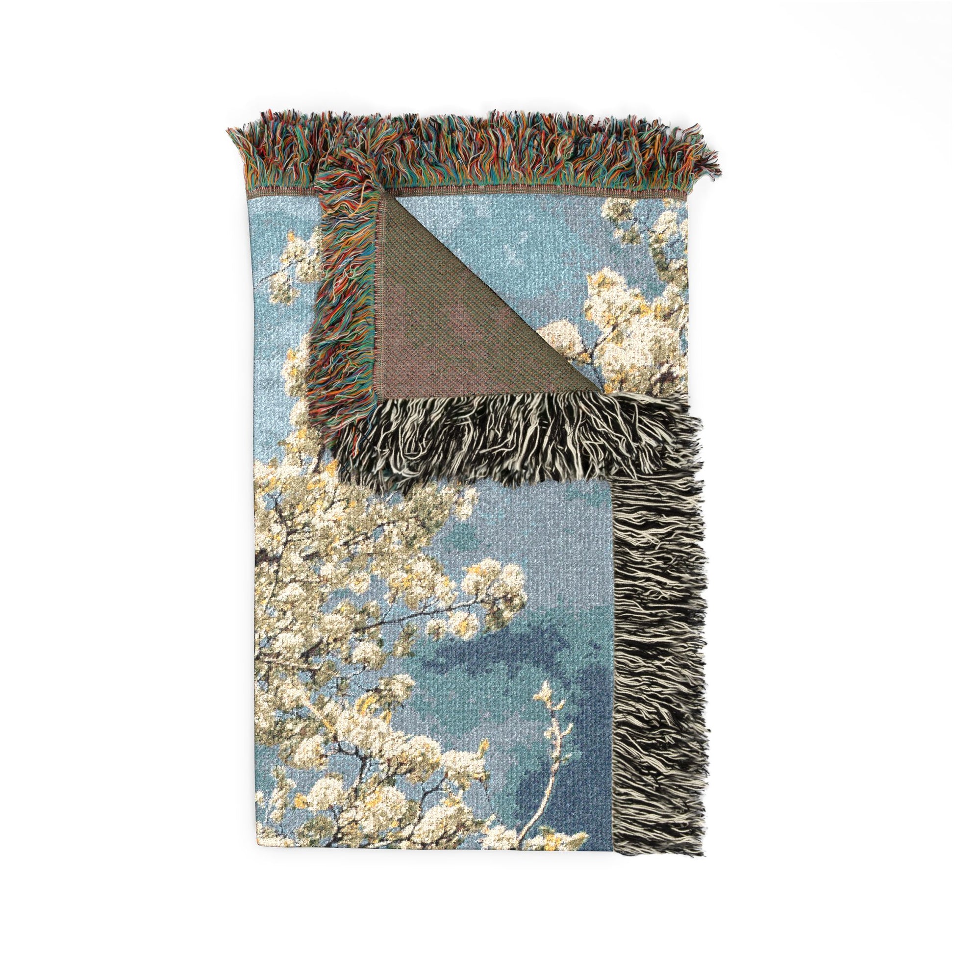 Tree in Bloom woven blanket with fringes, folded