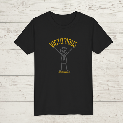 Black t-shirt with yellow 'Victorious' graphic and text on a wooden surface