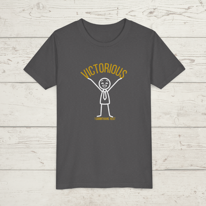 Dark gray t-shirt with a graphic design on a wooden surface