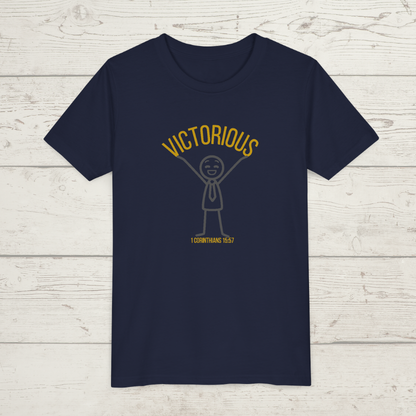 Navy blue t-shirt with 'Victorious' graphic design on a wooden surface