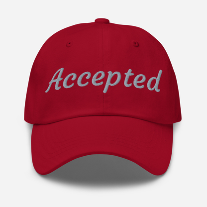 Red cap with 'Accepted' text on a white background