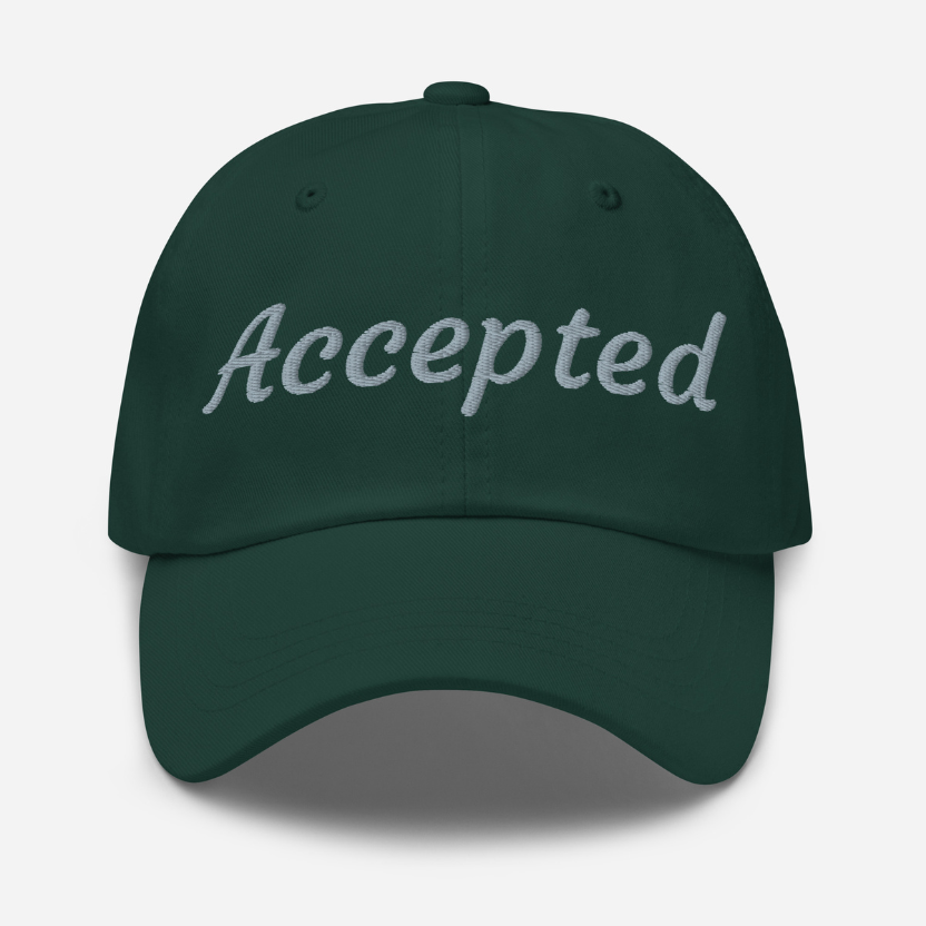 Spruce cap with 'Accepted' text on a white background