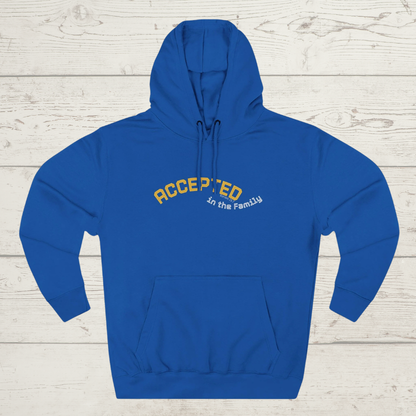 Royal Blue hoodie with 'ACCEPTED in the Family' text on a wooden surface