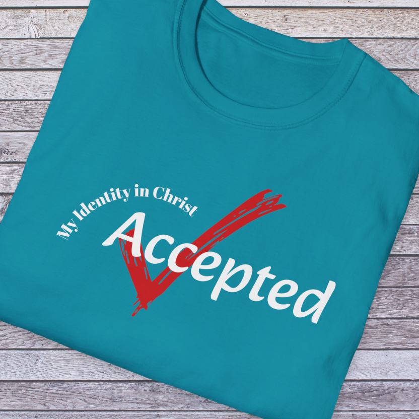 Tropical Blue Teal t-shirt with 'My Identity in Christ Accepted' text on a wooden surface