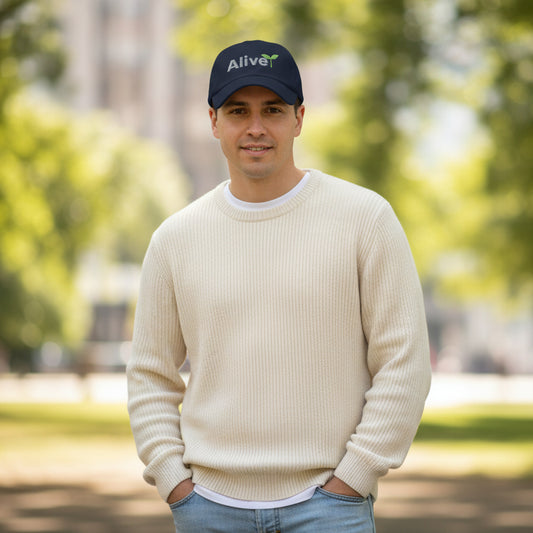 Navy blue cap with 'Alive' text and green plant leaf graphic