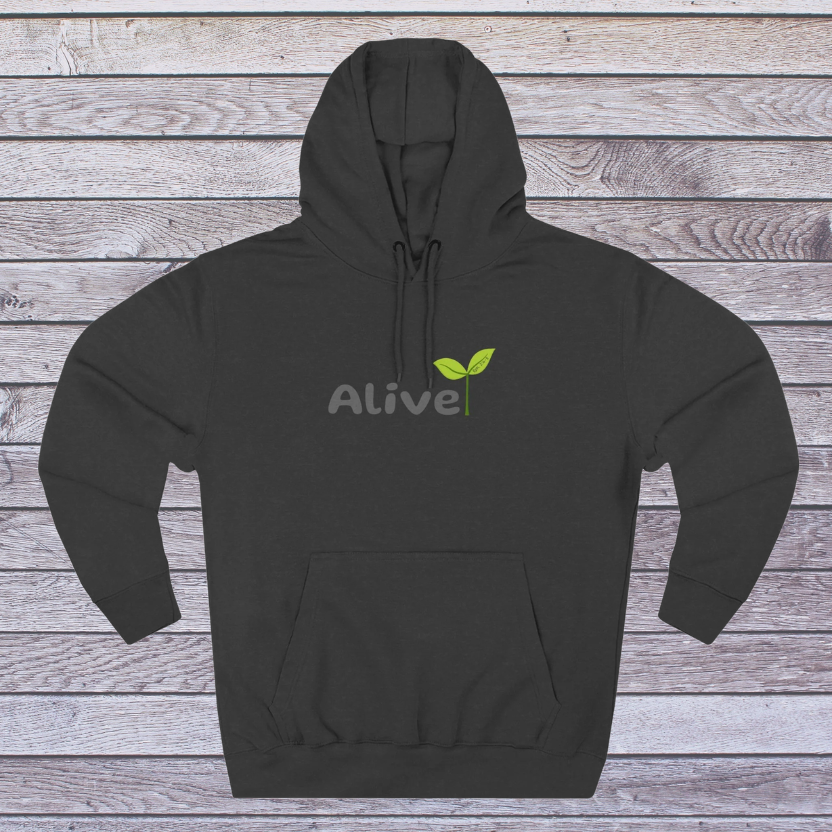 Charcoal Heather hoodie with 'Alive' logo on a wooden surface