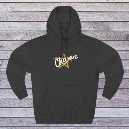 Charcoal Heather hoodie with a gold star and white text on a wooden background