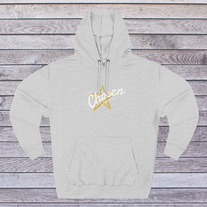 Gray hoodie with 'Chosen' and a star design on a wooden background