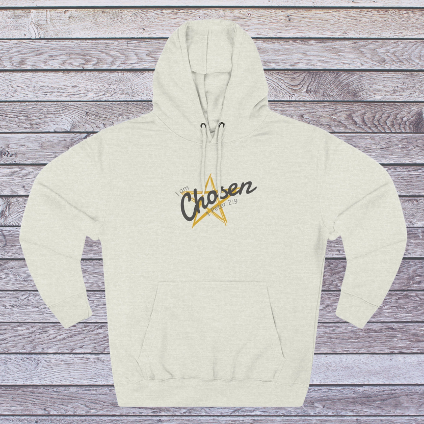 Oatmeal Heather hoodie with 'Chosen' text and star design on a wooden surface