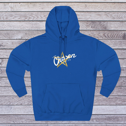 Blue hoodie with 'Chosen' text and star design on a wooden background
