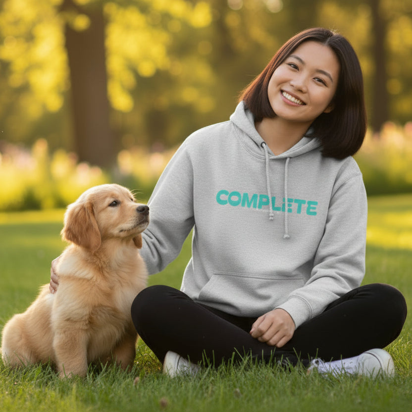 Gray hoodie with 'COMPLETE' text in teal with cute puppy outside