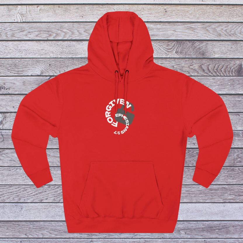 Red hoodie with a logo on a wooden background, 'Forgiven, Ephesians 1:7' and an unlocked lock
