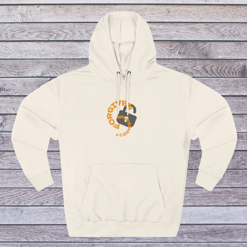 Sand Shell Beige hoodie with a graphic design on a wooden surface