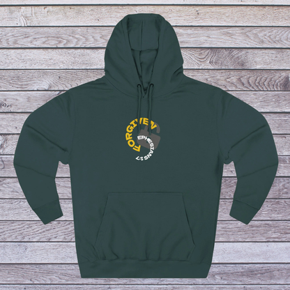 Green hoodie with a logo on a wooden surface, 'Forgiven, Ephesians 1:7' and an unlocked lock
