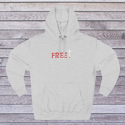 Gray hoodie with 'FREE!' printed on it against a wooden background, 'I am free, Galatians'