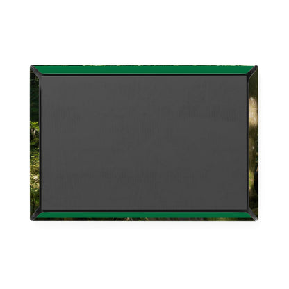Black rectangular sign with green border on a white background