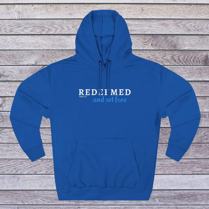 Royal Blue hoodie with text on a wooden background