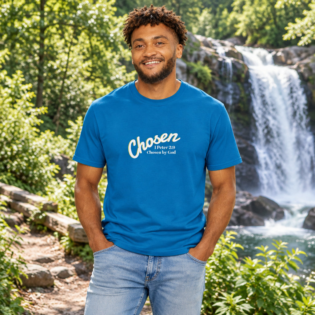 A man wearing a bright blue crewneck t-shirt with the text 'Chosen' in white shadowed script