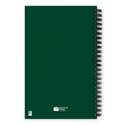 Green notebook with spiral binding on a white background