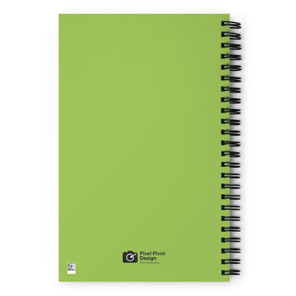 Green notebook with spiral binding on a white background
