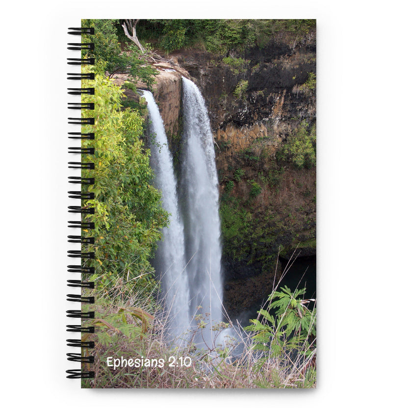 Notebook with a waterfall design and 'Ephesians 2:10' text on the cover