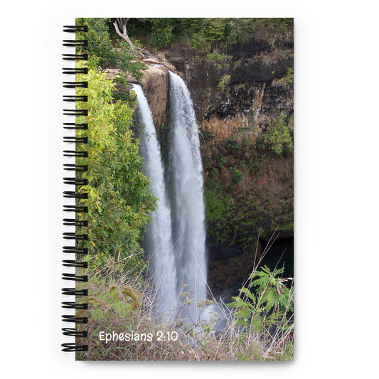 Notebook with a waterfall design and 'Ephesians 2:10' text on the cover