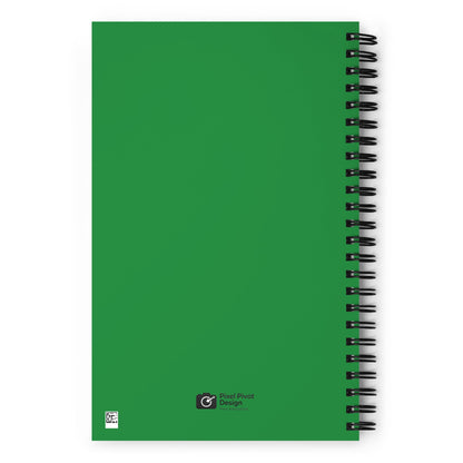 Green notebook with spiral binding on a white background