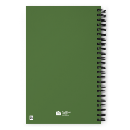 Green notebook with spiral binding on a white background